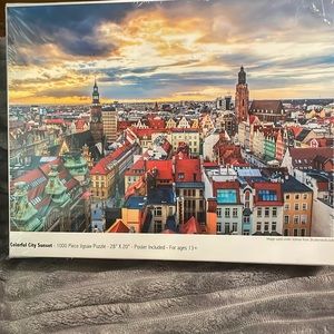 1000 piece puzzle 28”X 20” “Colorful City Sunset”.Factory sealed,poster included